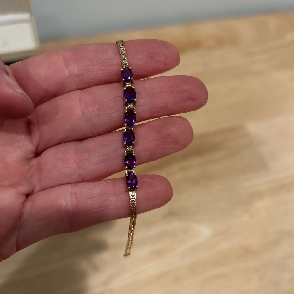 Elegant Gold and Purple Bracelet